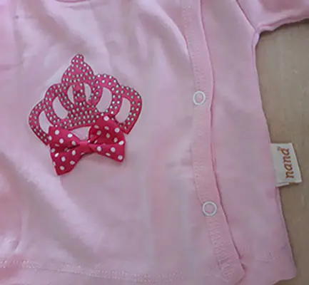 Photo from the official notice: Nana babies' clothing set — choking risk
