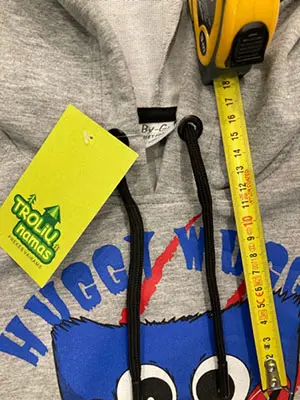 Photo from the official notice: Huggy Wuggy children's sweatshirt — strangulation risk