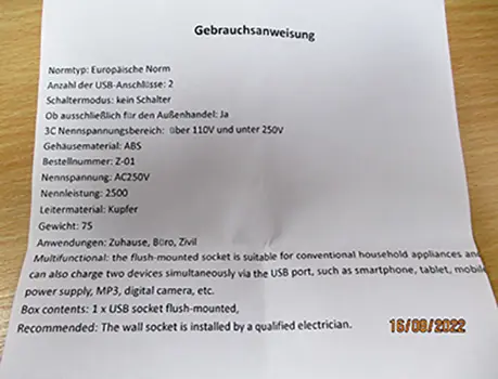 Photo from the official notice: In-wall socket — electric shock & fire risk
