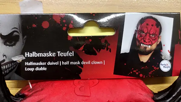 Photo from the official notice: Party x People, Rubie's Half mask devil / Halbmaske Teufel fancy-dress mask — burns risk
