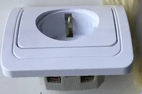 Photo from the official notice: Wall socket — electric shock & fire risk