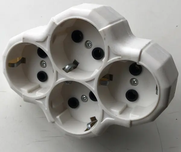 Photo from the official notice: Multiplug socket — electric shock & fire risk