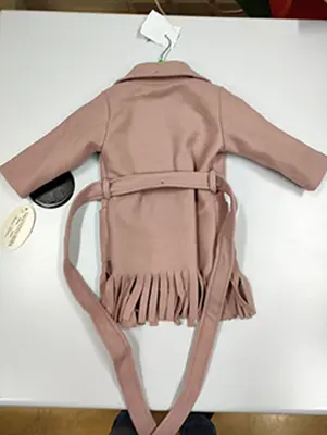 Foto uit de officiële melding: Valentina Moda Kinderjas — risico: Verwonding