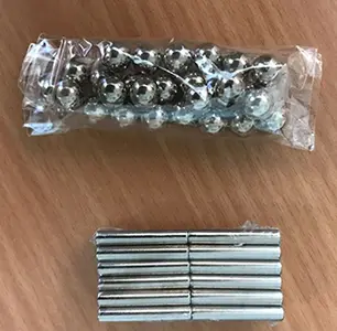 Foto dell’avviso ufficiale: Magneet Bouwset - magnetische staven en metalen ballen 63 delig Set di edifici magneti — rischio: Ostruzione delle vie aeree & Lesioni