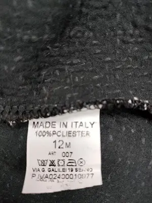 Foto uit de officiële melding: MODA Kinderjasje — risico: Verwonding
