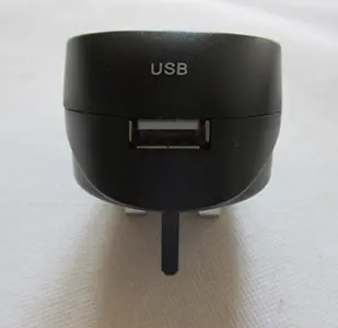 Foto do aviso oficial: Adaptador de viagem — risco: Choque elétrico (A12/00524/23)
