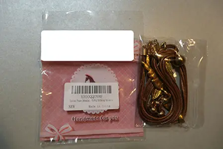 Photo de l’avis officiel: Collier avec pendentif — risque: Risque chimique (INFO/00028/23)