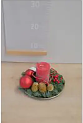 Foto do aviso oficial: Grinalda com velas — risco: Incêndio