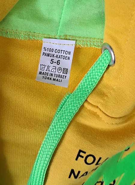 Photo from the official notice: MG children's sports outfit — injuries & strangulation risk