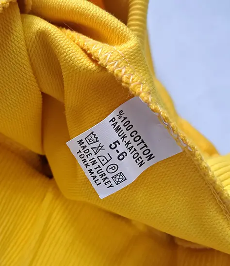 Photo from the official notice: MG children's sports outfit — injuries & strangulation risk