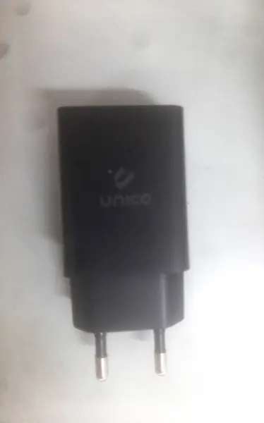 Foto uit de officiële melding: UNICO TRAVEL CHARGER KIT (Carregador de viagem) USB-lader — risico: Elektrische schok