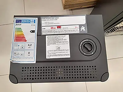 Photo from the official notice: Junex Aquecedor a gás (Gas heater) — burns risk