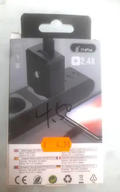 Photo from the official notice: OnePlus WALL CHARGER with IP6/7/8/XS/XR Cable (Carregador Cabo de Rede IP6/7/8/XS/XR) usb charger — electric shock risk