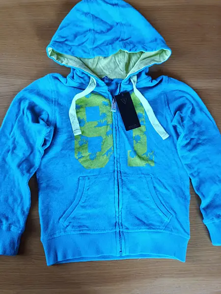 Photo from the official notice: Guess children's jacket — injuries & strangulation risk