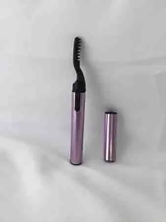 Foto uit de officiële melding: UNIQ Heated eyelash curler Elektrische wimperkruller — risico: Milieu