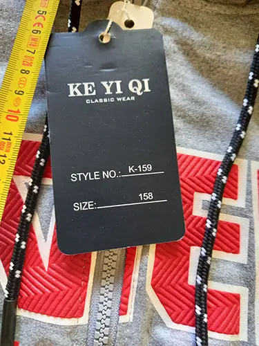 Foto do aviso oficial: Ke Yi Qi KE YI QI Camisola com capuz — risco: Ferimentos & Estrangulamento (A12/02757/23)