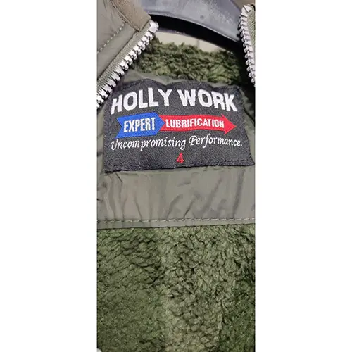 Foto uit de officiële melding: Holly Work Kinderjasje — risico: Verwonding & Verwurging