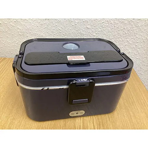 Photo from the official notice: Kimfead Electric Lunch Box / Electric Heating Lunch Box electric lunchbox — electric shock risk