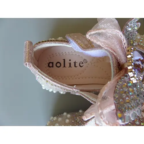 Foto do aviso oficial: AOLITE Sapatos para crianças — risco: Engasgamento (A12/00374/24)