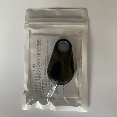 Foto uit de officiële melding: Two way alarm smart Bluetooth tracker — risico: Milieu