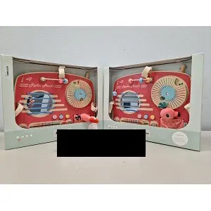 Photo from the official notice: Lilliputiens Radio anais activitypanel activity panel toy — choking risk