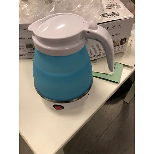 Photo from the official notice: Electric Kettle und TRAVEL FOLDING ELECTRIC KETTLE foldable kettle — electric shock risk
