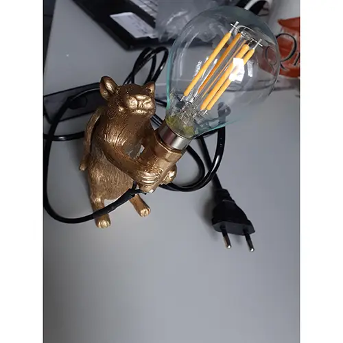 Foto do aviso oficial: Zhaocaigui Candeeiro de mesa — risco: Choque elétrico
