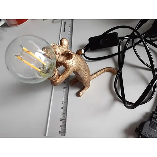 Foto do aviso oficial: Zhaocaigui Candeeiro de mesa — risco: Choque elétrico