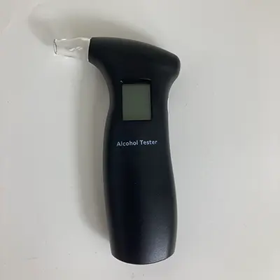 Foto uit de officiële melding: Alcohol Tester Digital Breath Alcohol Tester Alcoholtester — risico: Milieu