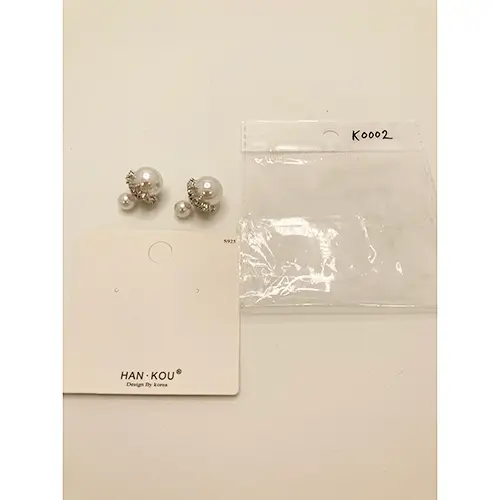 Photo de l’avis officiel: Han Kou Design by Korea Han Kou earrings, pearl/silver lace Boucles — risque: Risque chimique