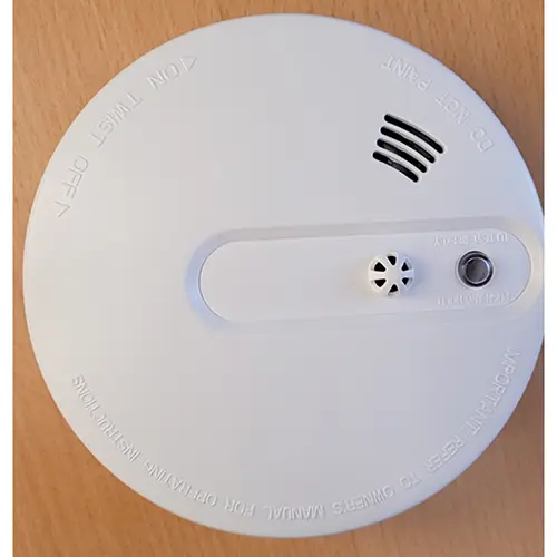 Photo from the official notice: Photoelectric smoke and heat detector smoke alarm — suffocation & fire risk