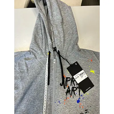 Foto do aviso oficial: Hm Sprint Art Camisola para criança — risco: Ferimentos & Estrangulamento
