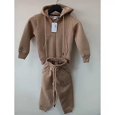 Foto uit de officiële melding: Snow kids Kinderkleding set — risico: Verwonding & Verwurging