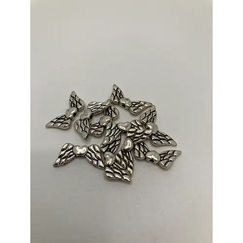 Photo de l’avis officiel: Vinge antiksilver med hjärta Perles de bijoux — risque: Risque chimique
