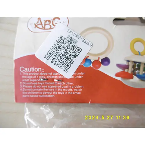 Foto aus der offiziellen Meldung: ABC Handle bel combination Spielzeugrassel — Risiko: Ersticken