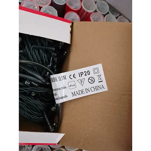 Photo from the official notice: D'OCHO LUZ DE NAVIDAD 140 LED LUZ AMARILLO lighting chain — burns & fire risk