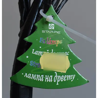 Photo from the official notice: Starpie Fa lámpa /Lampá de copac lighting chain — electric shock risk
