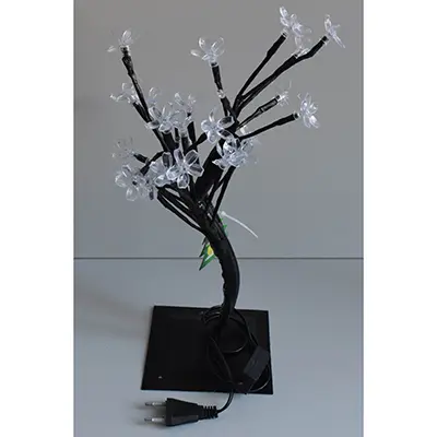 Photo from the official notice: Starpie Fa lámpa / Lampá de copac lighting chain — electric shock risk