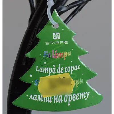 Photo from the official notice: Starpie Fa lámpa / Lampá de copac lighting chain — electric shock risk