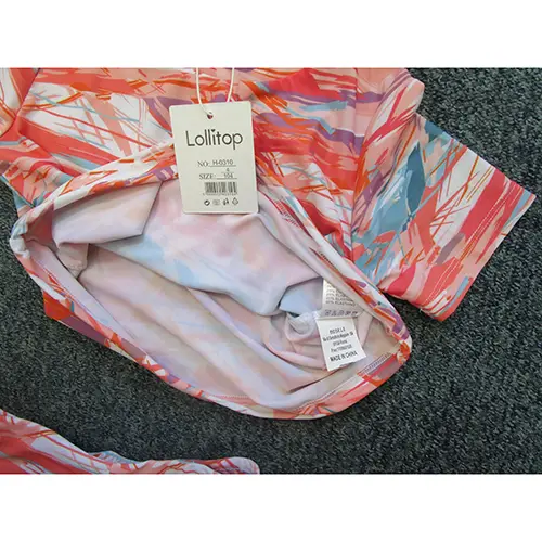 Foto uit de officiële melding: Lollitop Kinderkleding set — risico: Verwonding