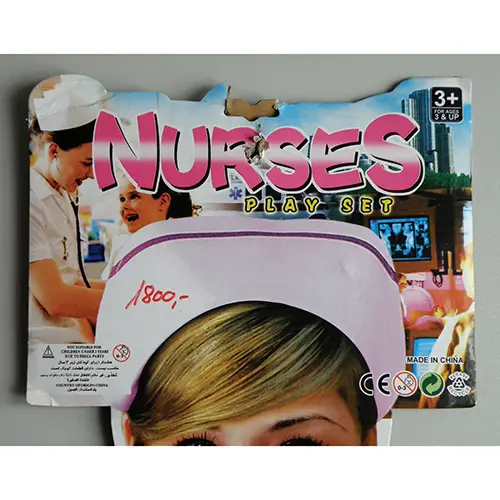 Foto uit de officiële melding: Nurses Play set Kinderkleding — risico: Brandwonden