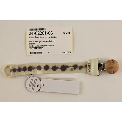 Photo from the official notice: Elodie Tidemark Drops pacifier clip soother holder — choking risk