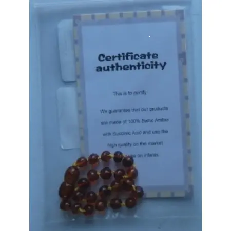 Foto uit de officiële melding: Kame aknys MB Collier de dentition en ambre pour bébé, perles baroques en ambrebaltique véritable Bijtring ket — risico: Verstikking door inslikken