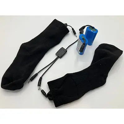 Photo from the official notice: Heated socks — environment risk