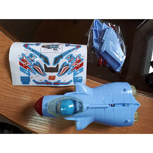 Foto do aviso oficial: SONGSEN TOYS FACTORY Plane Fighter Brinquedo elétrico de avião — risco: Ambiente