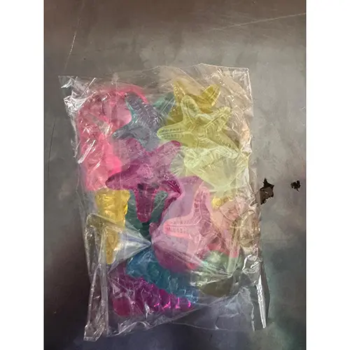 Foto aus der offiziellen Meldung: Shein Acryl Edelstein Spielzeug Set — Risiko: Ersticken