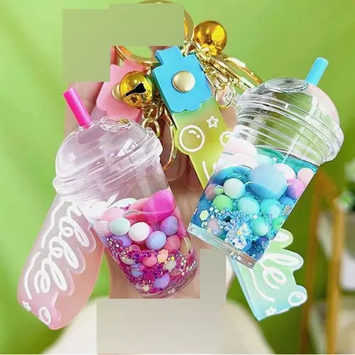 Foto aus der offiziellen Meldung: Porte-clés en forme de tasse de thé aux perles de tapioca fluorescent en acrylique pour femmes Schlüsselanhäng — Risiko: Chemikalie