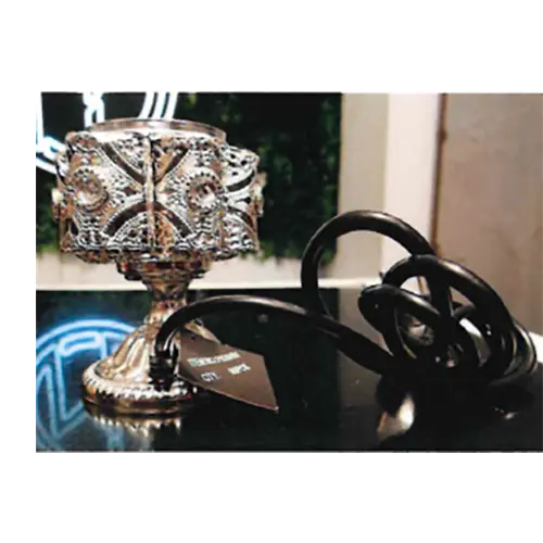 Photo from the official notice: AMIR’S Deco Bruleur d'encens électrique de luxe electric incense burner — electric shock & fire risk