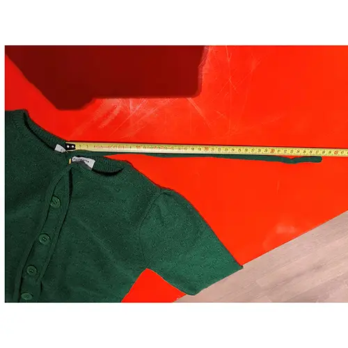 Foto uit de officiële melding: Compania Fantastica mini Kindervest — risico: Verwonding & Verwurging