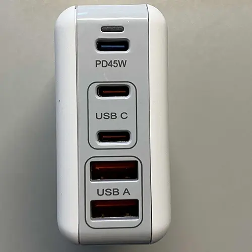 Photo from the official notice: Wolee USB C Ladegerät 100W, USB C Netzteil 5 Ports mit Schalter, GaN PD 45W Laptop Port, Geflecht-Kabel usb c  — electric shock risk